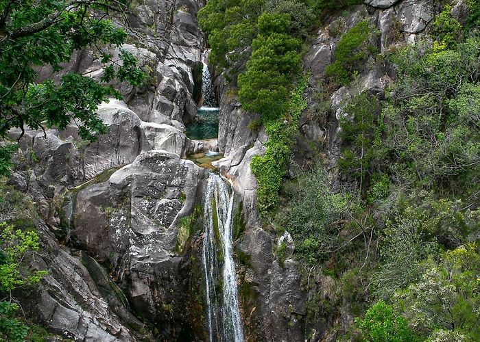 Arado Waterfall Premium Photo | Front view from above of a natural waterfall in ... photo
