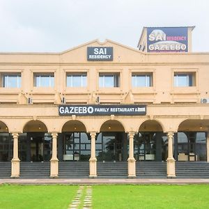 Capital O Sai Residency Hotel Vasind Exterior photo